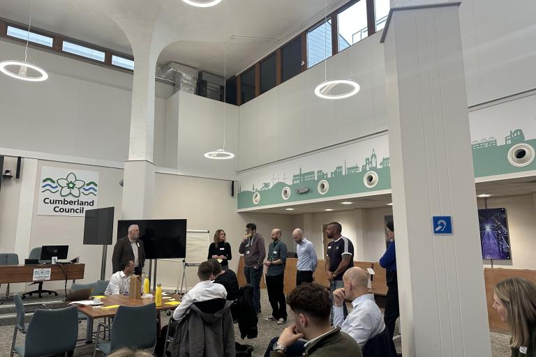Mark Gannon from Netcall introduces 6 council representatives to pitch their discussion topic ideas
